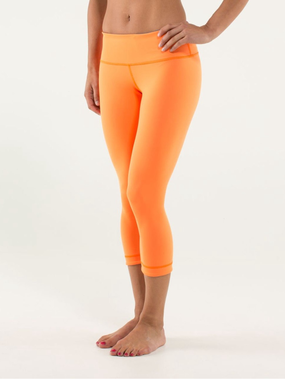 Size 4 Lululemon Wunder Under Crop in Soot Light/Pizzaz